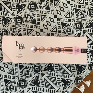 Lange Le Perle bubble wand in blush. Brand new in box. Never used.